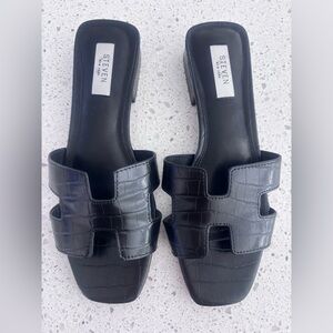 Size 9.5 Steven by Steve Madden Black Croc-Embossed Slide Mules.
